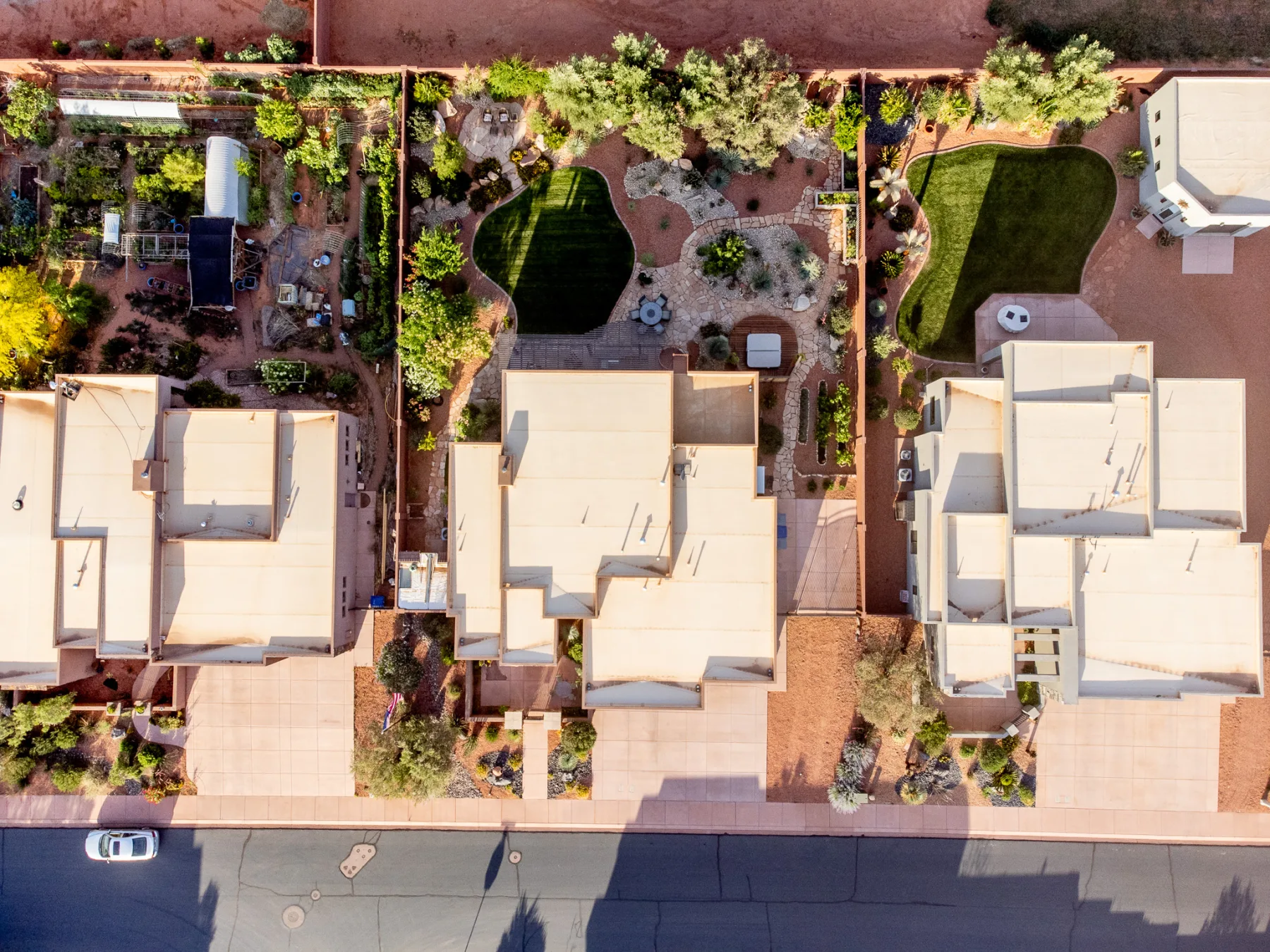 Top-down drone photograph of the Ivins residence and yard