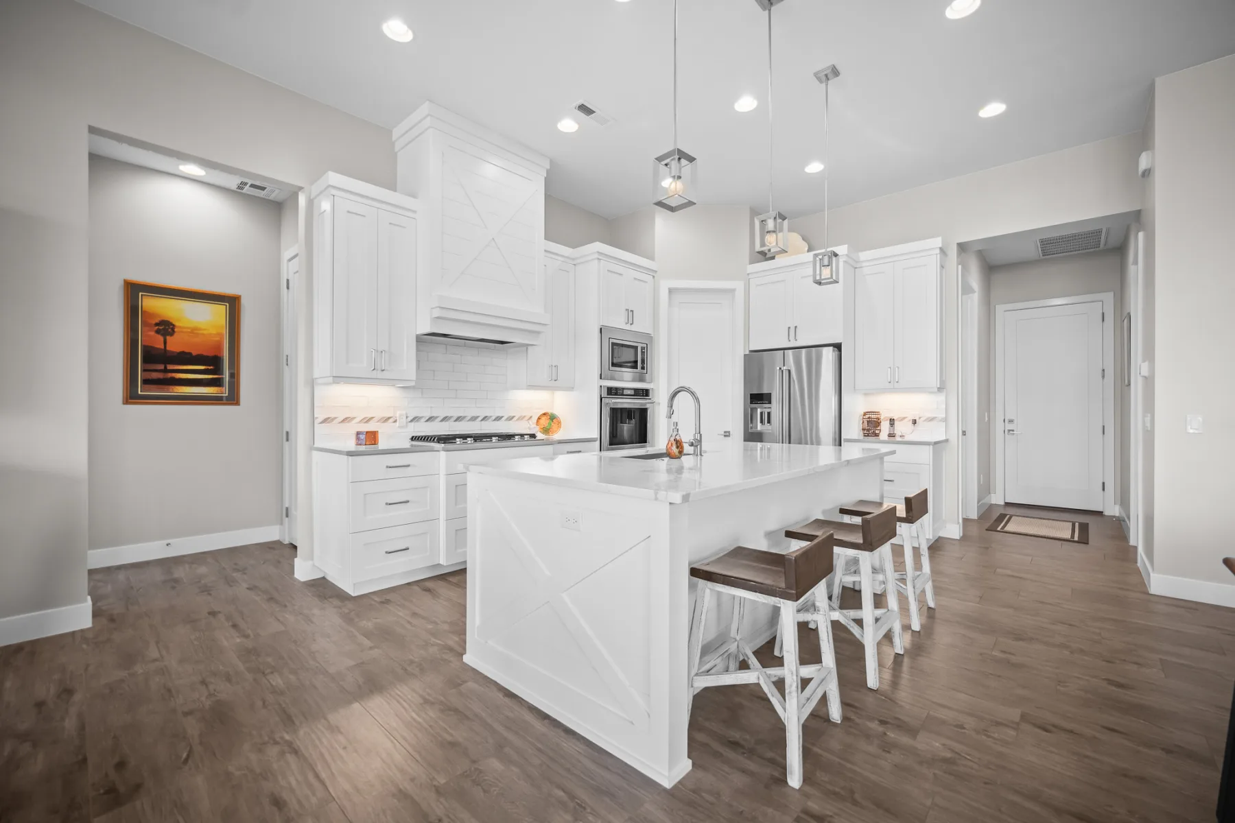 White kitchen photographed for an Ivins property listing