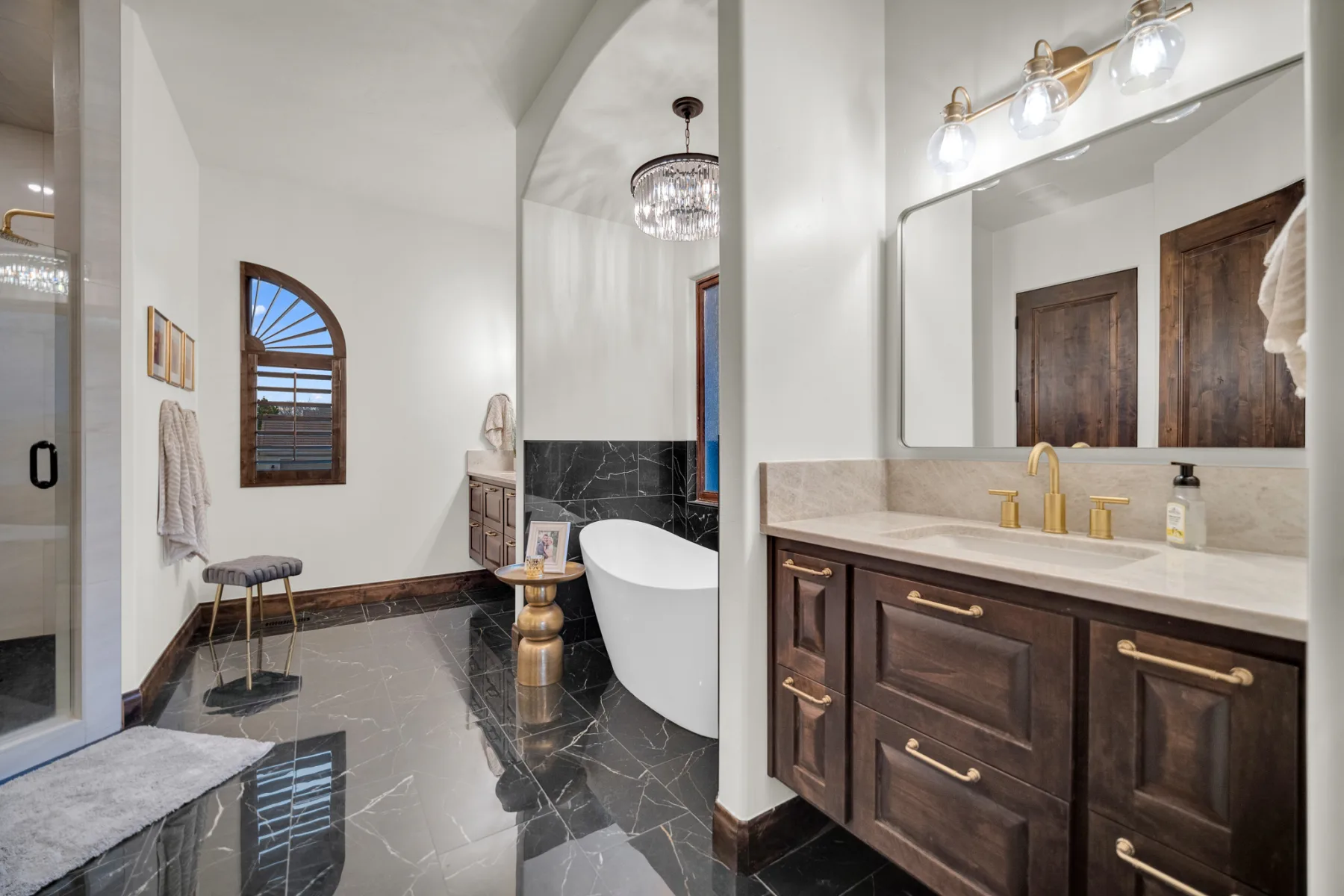 Primary bathroom with freestanding tub in the Malago residence